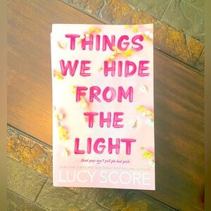 LUCY SCORE: THINGS WE HIDE FROM THE LIGHT